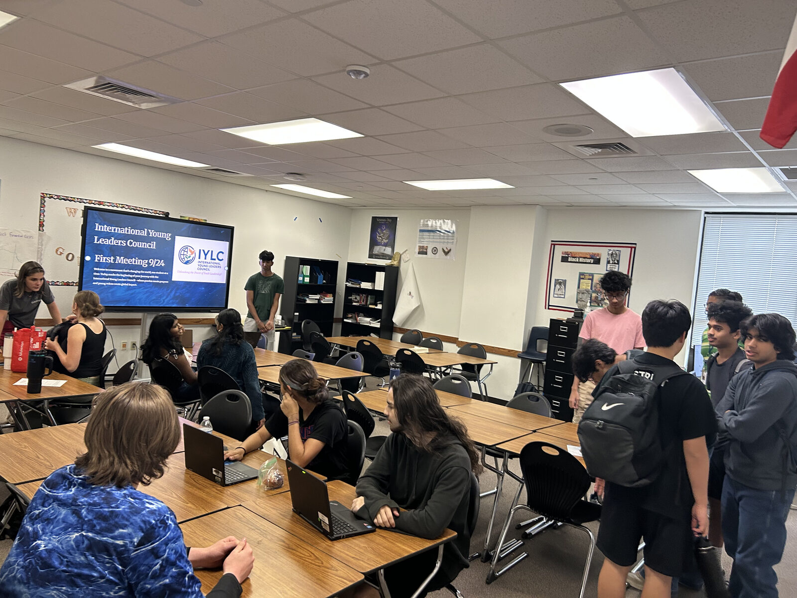 Students at an IYLC chapter's first meeting in a Texas classroom